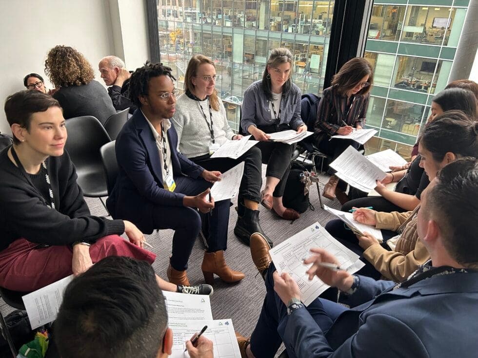 IMG_8504-980x735 A group of people sitting in a circle