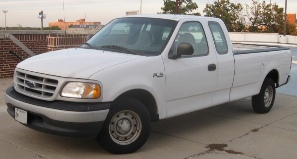 Circa 2000 Ford F-150 long bed pickup truck