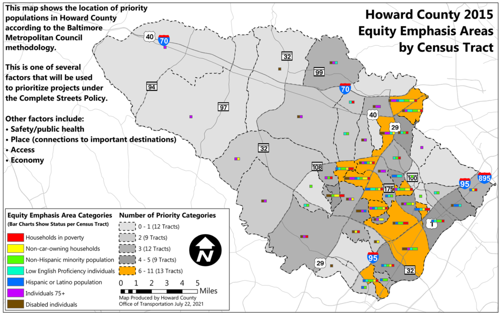 A gray map of Howard County highlights areas in orange where underserved populations live