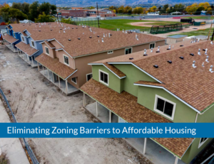 Cover image for the report: Eliminating Zoning Barriers to Affordable Housing. With text imposed over new construction of colorful duplexes under construction