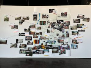  A large white wall display map covered in photos and writing illustrating the ideas of Boyle Heights residents